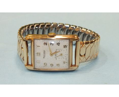 Rotary, a gents 9ct-gold-cased rectangular face wrist watch with Arabic numerals and subsidiary seconds, the movement numbere
