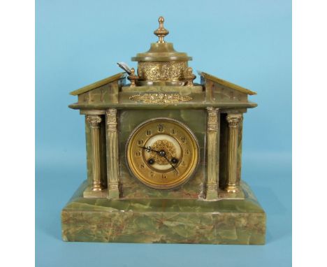 A green onyx and gilt-metal-mounted mantel clock of architectural form, the two-piece gilt metal and enamelled dial with bead