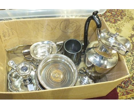 A pair of plated bottle coasters with beaded rims, a chamber stick and other plated ware.