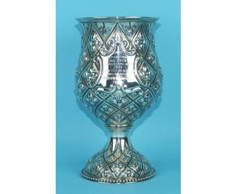 An Interesting Canine Show trophy cup by Alexander Macrae of baluster goblet form on domed foot with beaded rim, overall latt