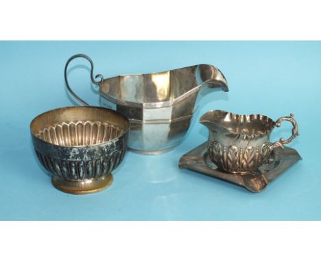 A Victorian half-gadrooned small sugar bowl, 9cm diameter, Sheffield 1888, an embossed cream jug and other small silver, ___9