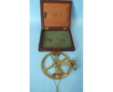 A brass surveyor's protractor by Negretti and Zambra, London, with a silvered dial and a pair of hinged index arms, 15.5cm di