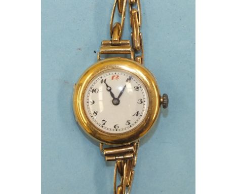 A ladies 18ct-gold-cased wrist watch with white enamel dial and "Peerless" movement, on 9ct gold expanding bracelet (af).