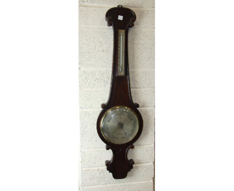 A 19th century rosewood wheel barometer with silvered thermometer scale and circular dial, signed 'C Crew Tetbury', 97cm high