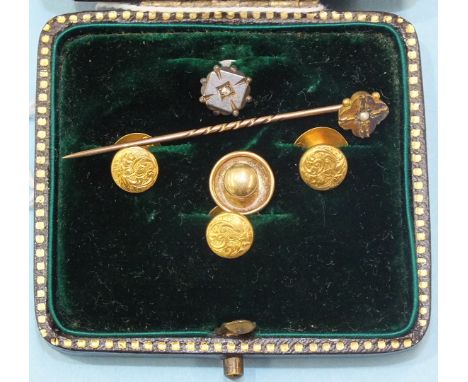 Three matching 15ct gold dress studs, boxed and another set a diamond point, 3.2g, a 9ct gold stud and a small stick pin.