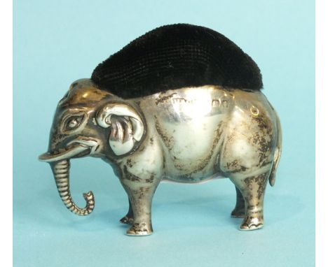 An Edwardian novelty silver elephant pin cushion, possibly by S & Co, modelled in a standing position, blue velvet cushion, 6