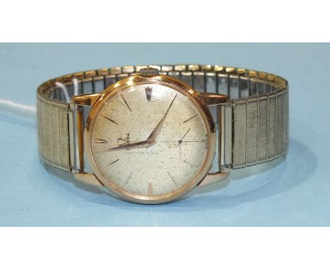 Omega, a gents 18ct-gold-cased wrist watch, c1958, the gilt dial with baton numerals and seconds subsidiary, the movement num