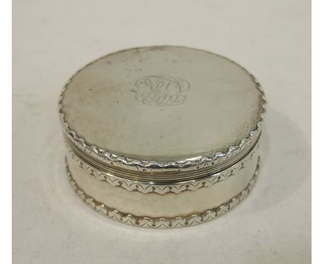 A Tiffany & Co. sterling silver large snuff box of circular shape and twist-lock lid, 7cm diameter, ___4oz.