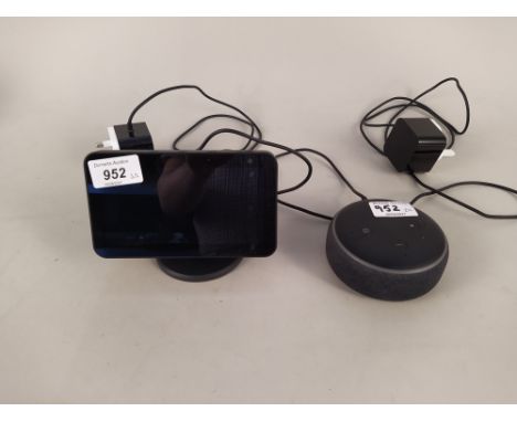 An Echo Dot plus an Echo 5 Show with chargers. This item is from a deceased's estate and the proceeds are being donated to Ca
