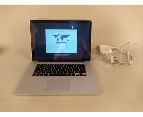 An Apple MacBook Pro 16 GB Retina, 15" screen, with charger.  This item is from a deceased's estate and the proceeds are bein