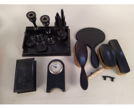 An ebony part dressing table set plus a wooden cased small barometer