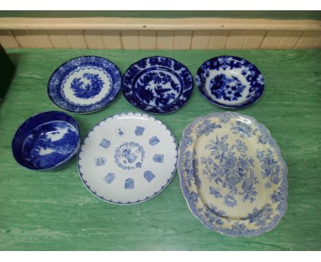 A selection of Victorian and later blue and white wares including Flow Blue plates, meat plate and a Prince of Wales transfer