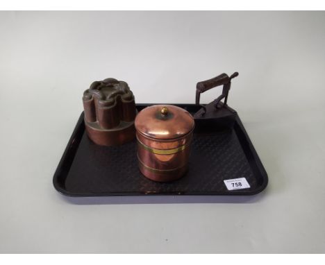 A late 19th Century 'Cuffs' box iron with brass foot, a 19th Century copper jelly mould stamped '470' plus a copper brass bou