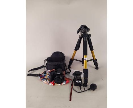 A Panasonic Lumix DMC FX330 camera with charger, camera case and tripod.  This item is from a deceased's estate and the proce