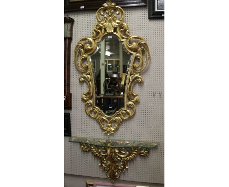A large gilt framed console bevel edge mirror.