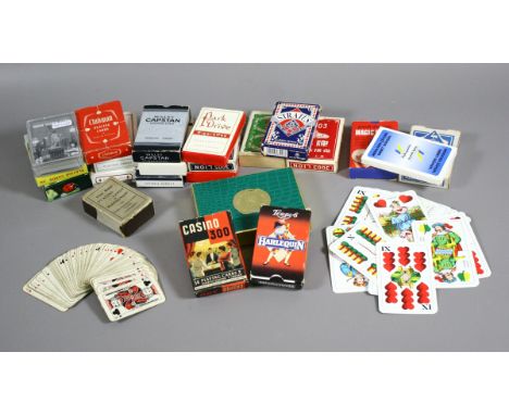 A collection of various playing cards to include smaller vintage examples.