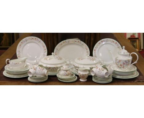 A Chelson fine china dinner/tea service decorated with flowers, approximately fifty pieces.