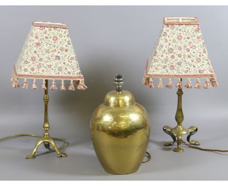 Two Benson style brass based tablelamps along with another table lamp.