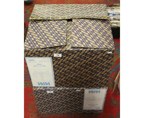 A pair of unused and boxed brass five branch ceiling light fittings along with five frosted glass shades.