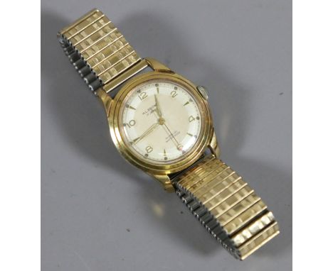 A gentlemens H L Brown gold plated wristwatch with satin dial and baton markers.