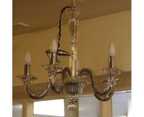 A glass and perspex five branch chandelier.  