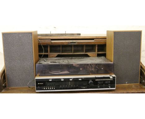 A retro Hitachi record player and speakers.