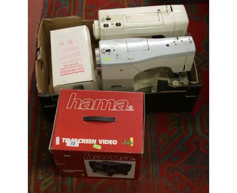 A box containing two electric sewing machines, a childs sewing machine and a boxed Hama projector.