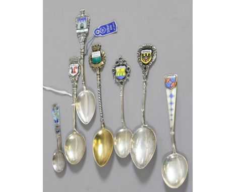 A collection of continental silver and enamel souvenir spoons, 60.7 grams.