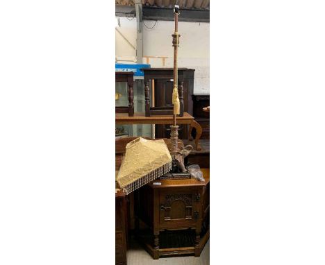 Old charm style oak cabinet along with a decorative standard lamp with elephant base