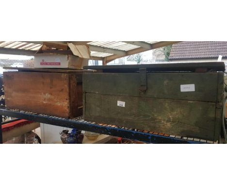 Carpenters trunk including tools along with another pine trunk with tools