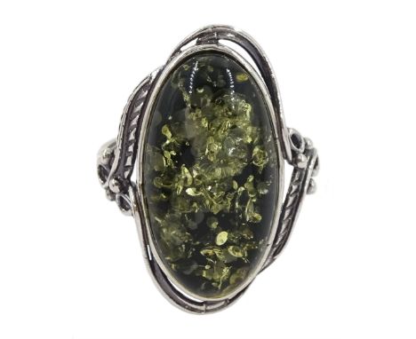 Silver single stone green amber ring, stamped 925Condition Report:Size R