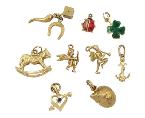 Nine 9ct gold charms including fairy, cherub, rocking horse, four leaf clover and anchorCondition Report:Approx 8gm, losses t