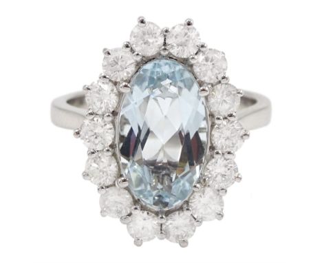 18ct white gold oval aquamarine and round brilliant cut diamond cluster ring, hallmarked, aquamarine approx 2.45 carat, total