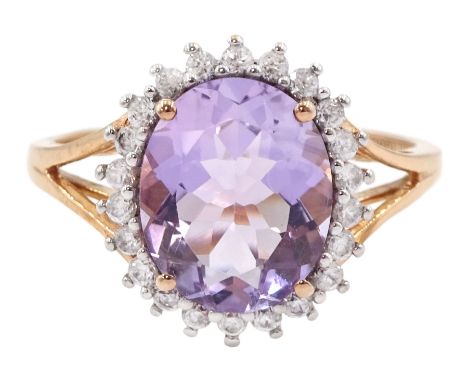 9ct rose gold oval amethyst and white zircon cluster ring, hallmarkedCondition Report:Approx 2.9gm, size R-S, head = 15mm x 1