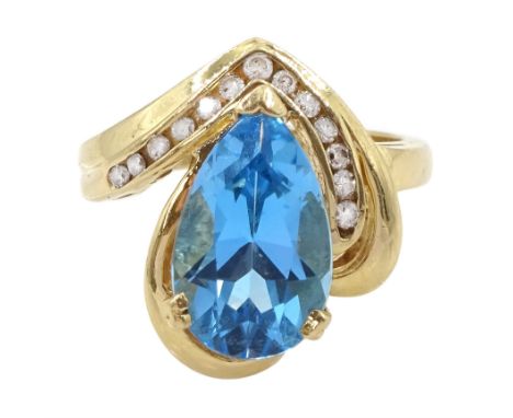 14ct gold pear cut blue topaz and round brilliant cut diamond ring, stampedCondition Report:Approx 5.75gm, tested 14ct also, 