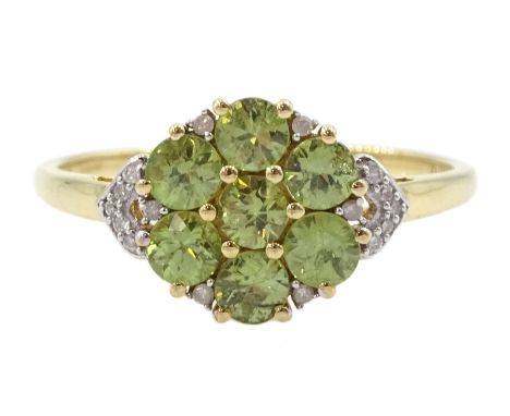 9ct gold demantoid garnet and round brilliant cut diamond cluster ring, hallmarkedCondition Report:Approx 1.95gm, size R-S, g