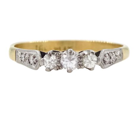 Gold three stone diamond ring, with diamond set shoulders, stamped 18ct Plat Condition Report:Approx 1.6gm, size L-M, good co