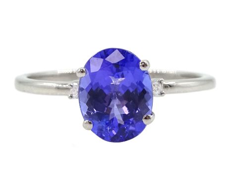 Platinum three stone oval tanzanite and round brilliant cut diamond ring, hallmarked, tanzanite approx 2.05 caratCondition Re