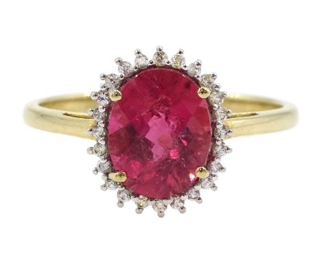 9ct gold rubellite tourmaline and white sapphire cluster ring, hallmarkedCondition Report:Approx 2.45gm, size R-S, head = 12m