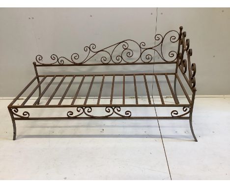 A wrought iron daybed, width 144cm, depth 60cm, height 80cm