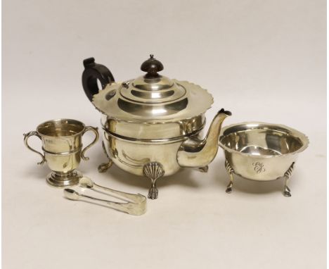 A George V silver teapot, J. Sherwood &amp; Sons, Birmingham, 1913, an Irish silver sugar bowl pair of silver sugar tongs and