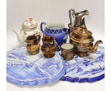 Nine ceramic items including two Dutch blue and white wall plaques, a silvered jug, a teapot, four items of lustreware and a 