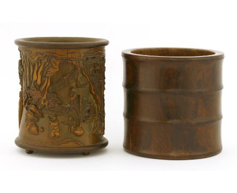 A Chinese wood bitong,of cylindrical form simulating bamboo,14.7cm high, anda bamboo brush pot,deeply carved with figures app