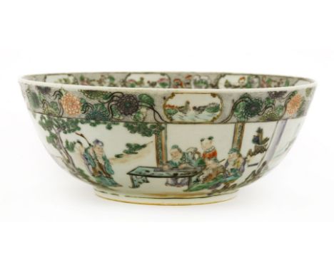 A Chinese rose verte punch bowl,early 20th century, painted with figures at leisure pursuits, including writing poems on a cl