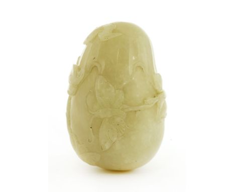 A Chinese jade snuff bottle, Qing dynasty (1644-1911), of gourd form, carved in relief with butterflies and a gourd with tend