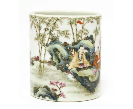 A Chinese famille rose brush pot,possibly Republic period, of cylindrical form, painted with a literatus playing qin with his