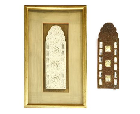 Two Chinese cribbage boards, late 19th century, one in sandalwood carved with scrolling flowers, inserted with bone panels ca