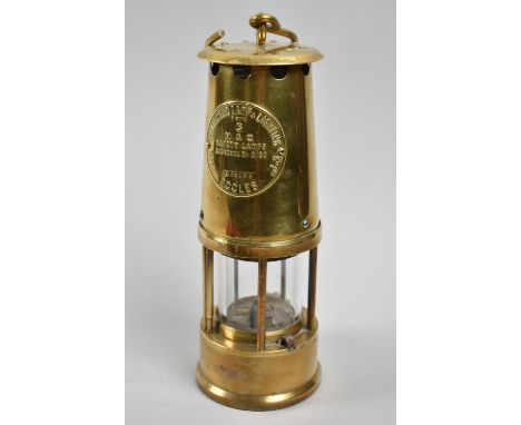 A Brass Miner's Safety Lamp by the Protector Lamp &amp; Lighting Company, 25cm high 