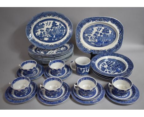 A Collection of Various Blue and White Willow Pattern Dinner and Teawares to comprise Cups, Saucers, Side plates, Oval Plates