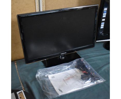 A Samsung 21" LED TV with Manual and Remote Control 